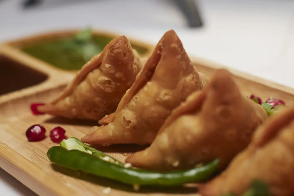 Crispy homemade samosas with chutney