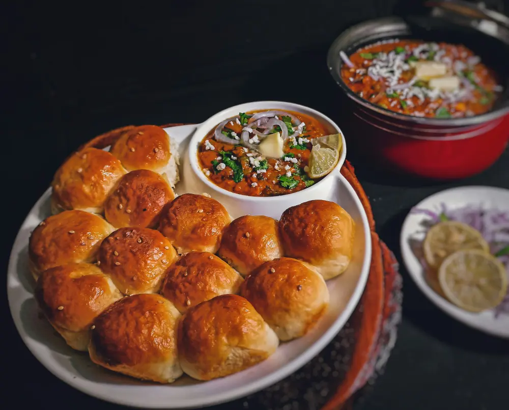 Traditional steel thali with assorted home-cooked dishes